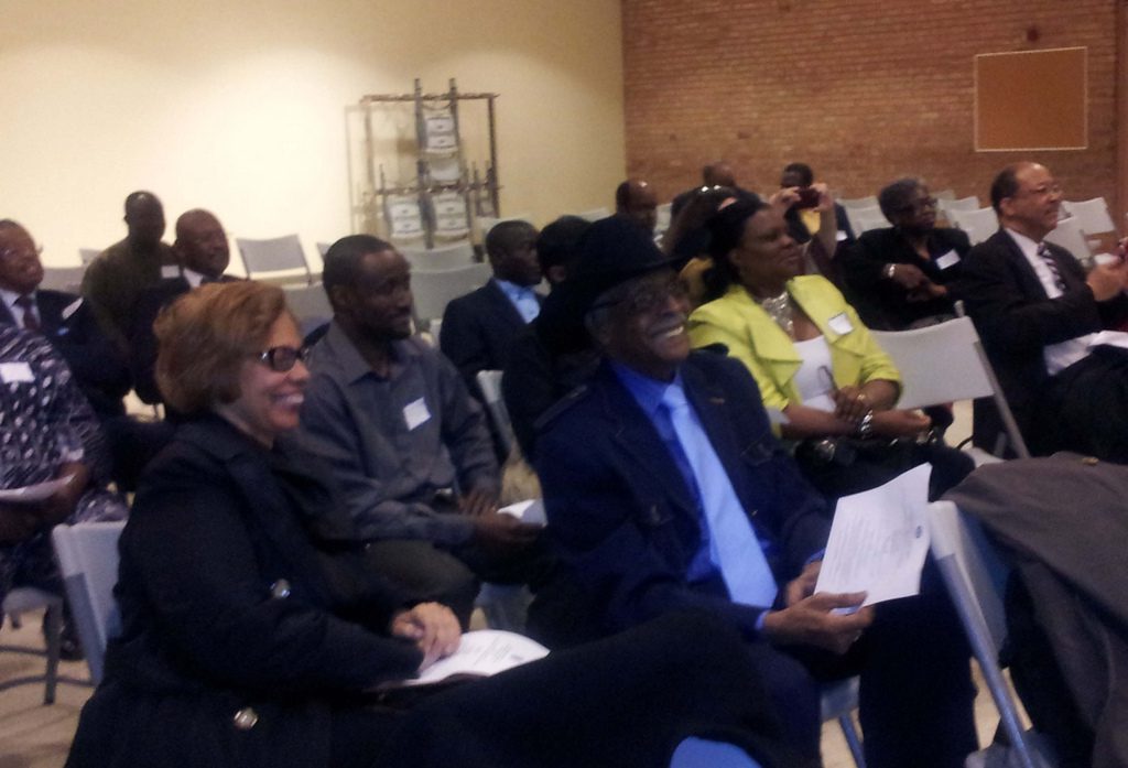 People attending a meeting in chairs