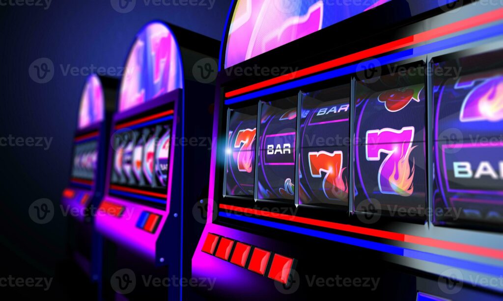 Close-up of colorful slot machines with vibrant lights in a casino.