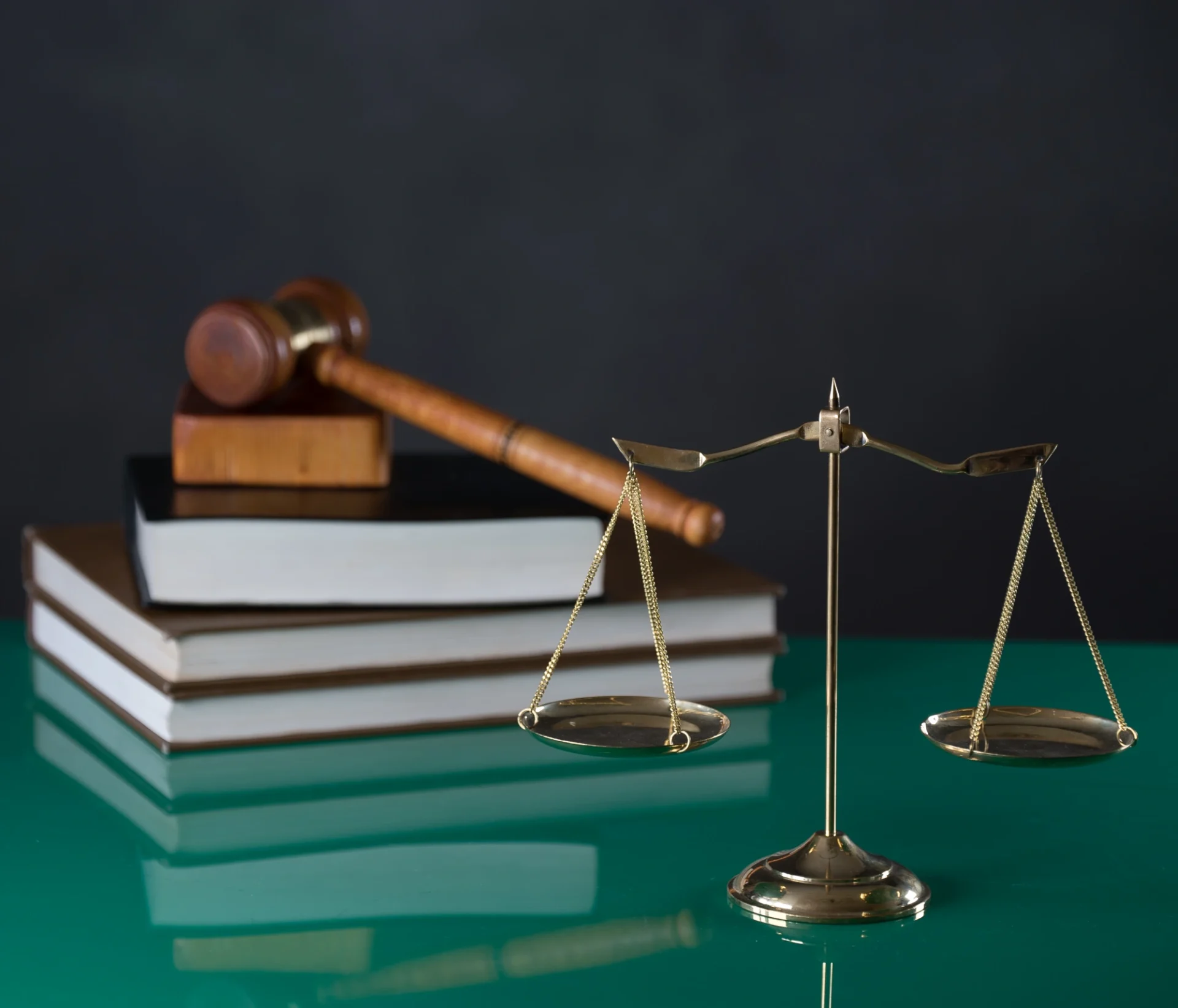 Scales and gavel on books