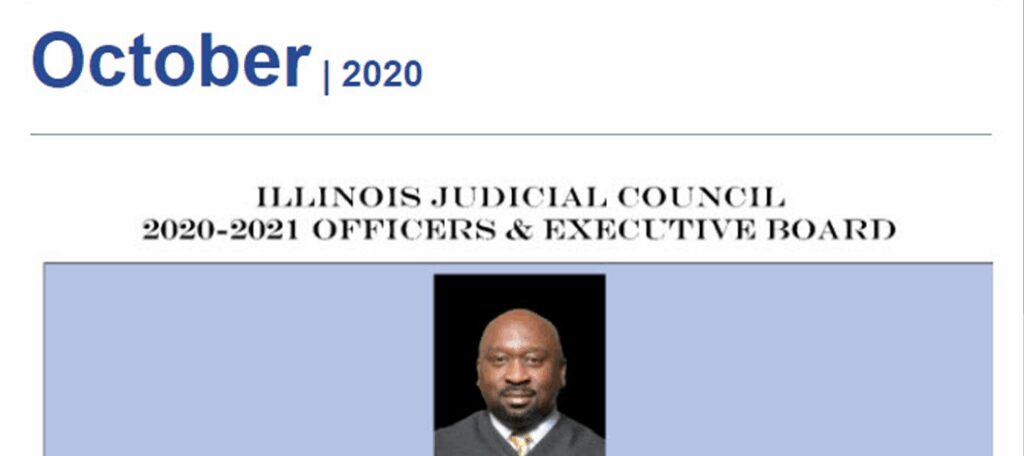Portrait of a man in a suit against a 2020 Illinois Judicial Council backdrop.