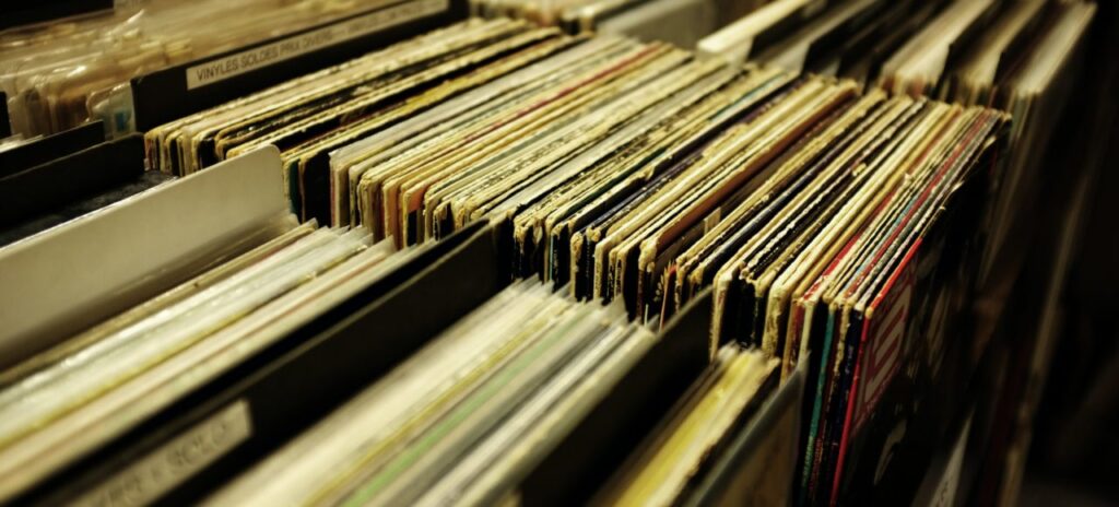 Rows of vintage vinyl records in sleeves.