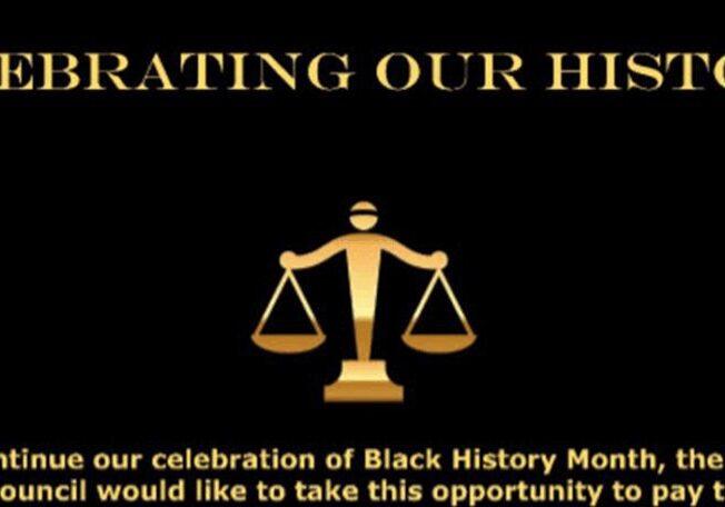 A Black History Month celebration banner featuring a gold scale of justice on black background.