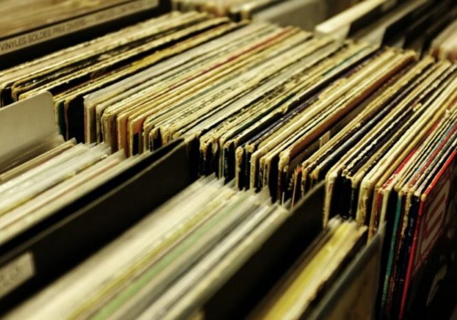 Rows of vintage vinyl records in sleeves.
